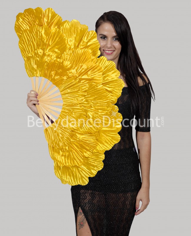 Large golden dance fan