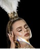 Rhinestones and feathers headdress
