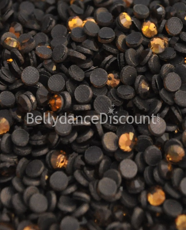 Lotto di 500 strass termoadesivi marroni