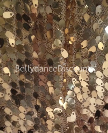 Tissu or scintillant vendu au mètre