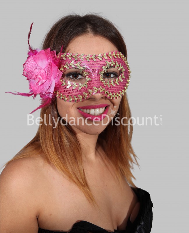 Máscara con flor fucsia y dorada
